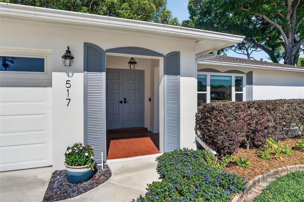 517 Roughbeard Road Winter Park, FL 32792 - Photo 38 of 53 a view of a house with a potted plant