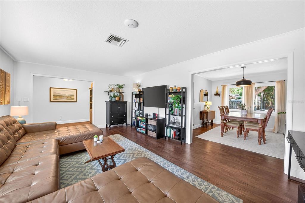 517 Roughbeard Road Winter Park, FL 32792 - Photo 44 of 53 a living room with furniture and wooden floor