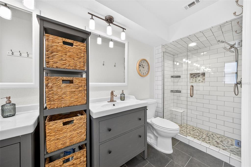 517 Roughbeard Road Winter Park, FL 32792 - Photo 6 of 53 a bathroom with a sink a toilet and shower