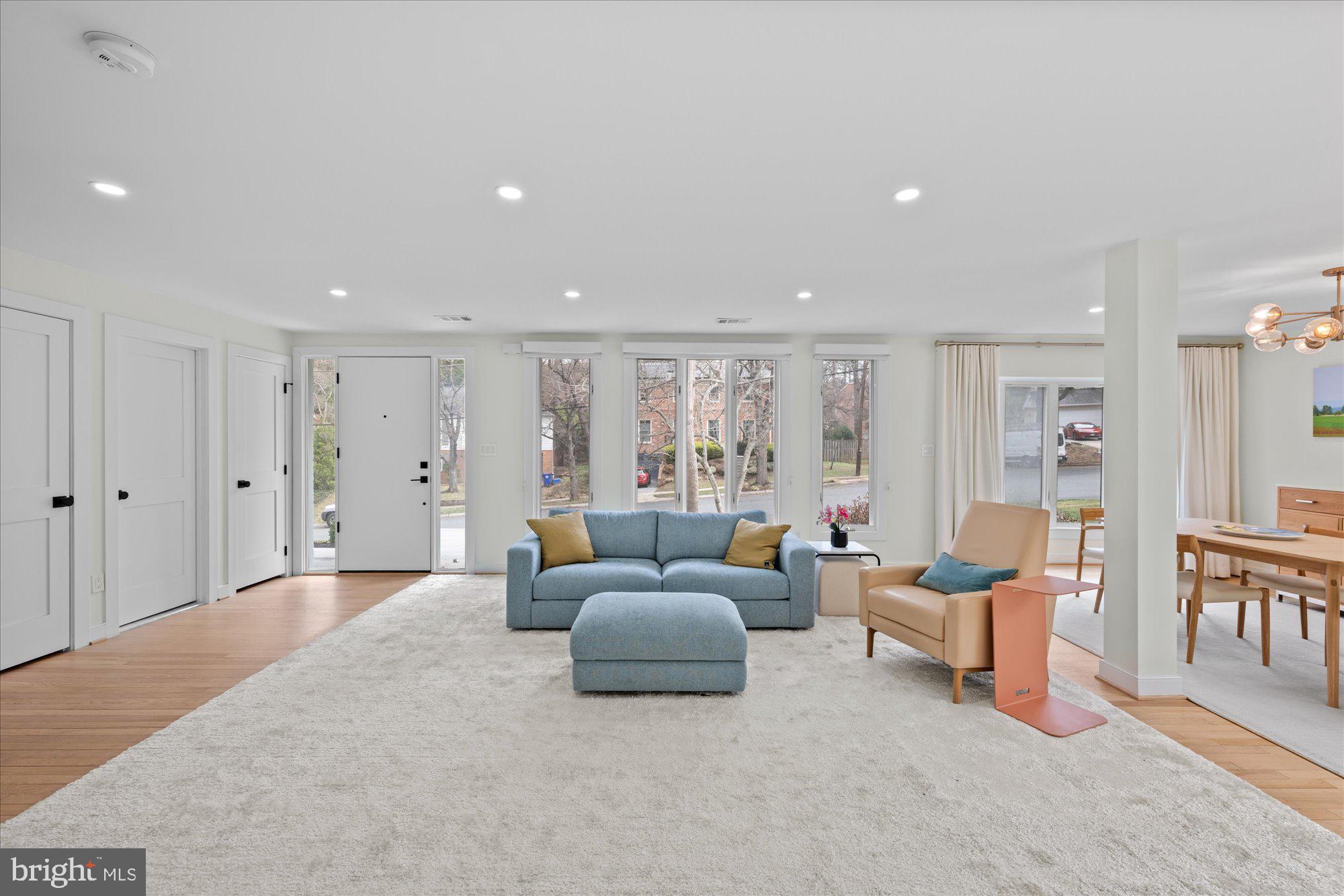 6700 Rannoch Road Bethesda, MD 20817 - Photo 5 of 36 a living room with furniture and a large window