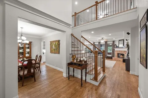 a view of a livingroom with furniture and hardwood floor