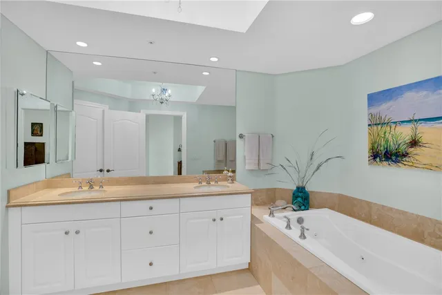 a view of a livingroom with workspace and a window