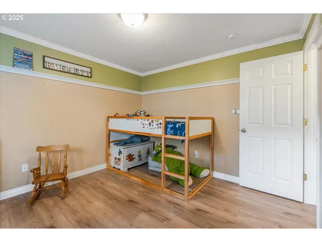 a room with furniture and a wooden floor