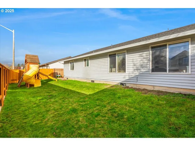 a backyard of a house with seating space