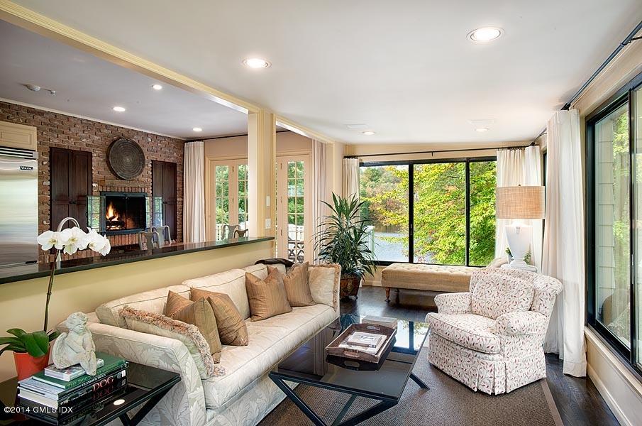 20 Bailiwick Road Greenwich, CT 06831 - Photo 25 of 32 a living room with furniture and a fireplace