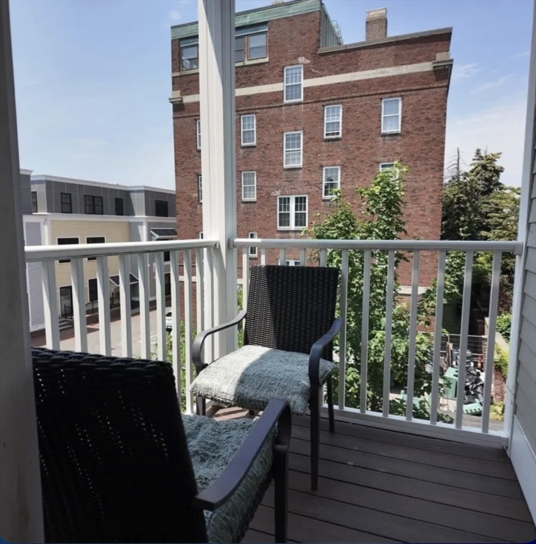 7 Loring Street, Unit 2 Boston, MA 02127 - Photo 10 of 10 a balcony view with a seating space