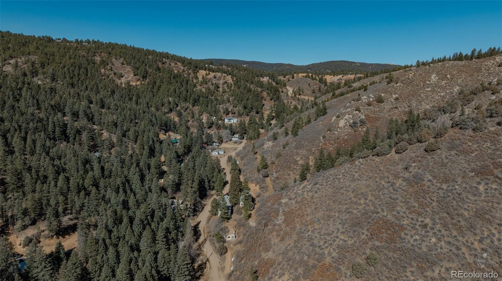 1906 Hidden Valley Road Sedalia, CO 80135 - Photo 24 of 27 a view of mountain view with mountains in the background
