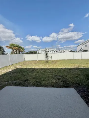 a view of a lake with a big yard