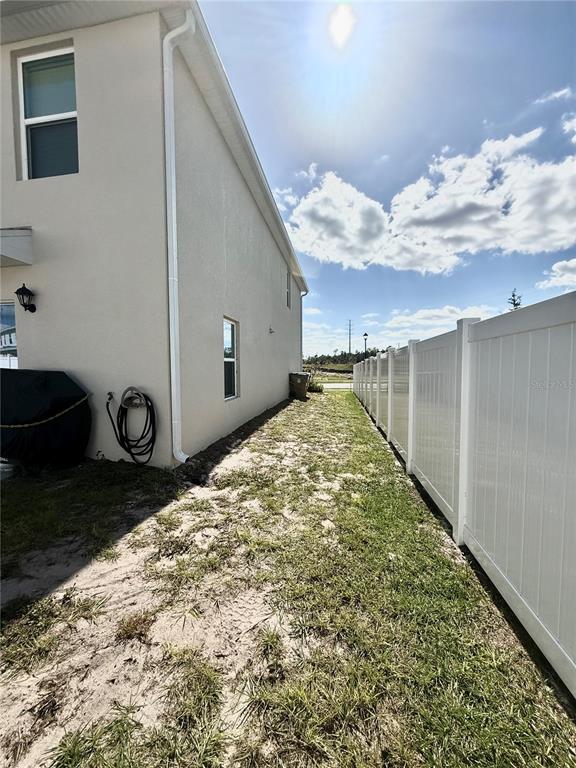 6576 Druid Way Harmony, FL 34773 - Photo 15 of 16 a view of a back yard