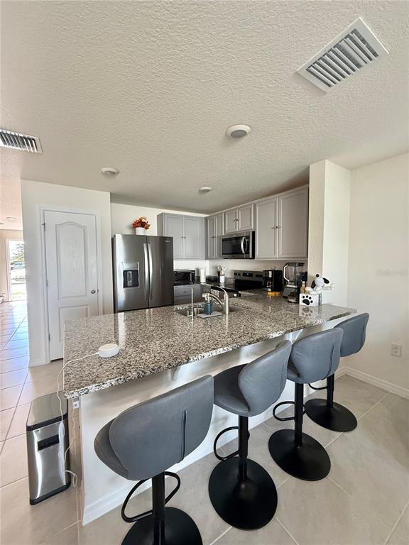 6576 Druid Way Harmony, FL 34773 - Photo 3 of 16 a kitchen with counter space cabinets and appliances