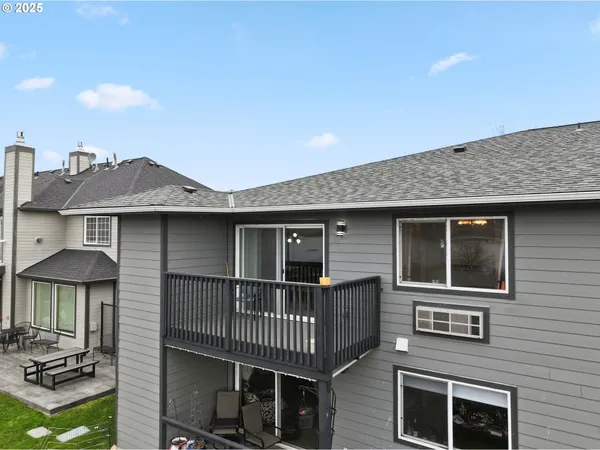 a front view of a house with parking space