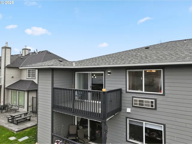 a front view of a house with parking space