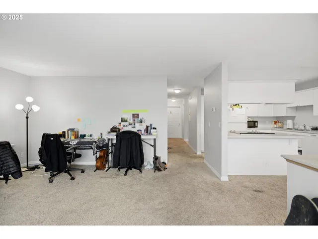 a view of a living room and bathroom