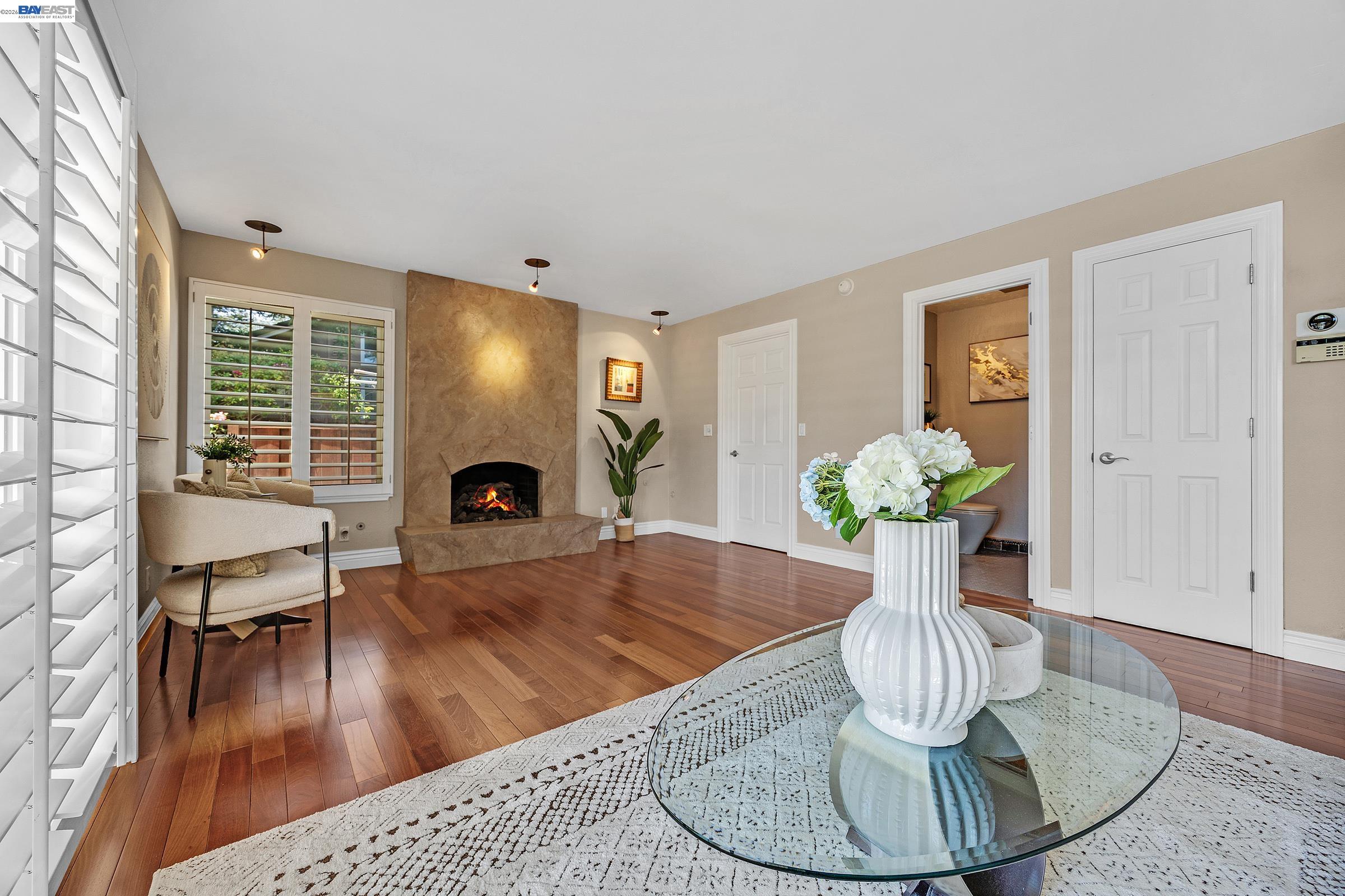 17 Suva Court San Ramon, CA 94582 - Photo 14 of 47 a living room with furniture and a fireplace