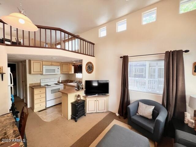17550 South Munds Ranch Road, Unit 323 Munds Park, AZ 86017 - Photo 5 of 26 family room and loft view