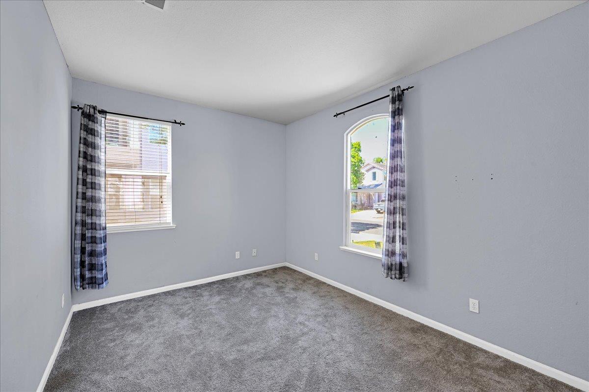 341 Barnhart Circle Sacramento, CA 95835 - Photo 17 of 55 an empty room with windows and mirror