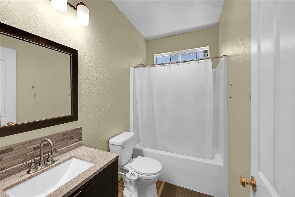 341 Barnhart Circle Sacramento, CA 95835 - Photo 19 of 55 a bathroom with a sink a toilet and shower