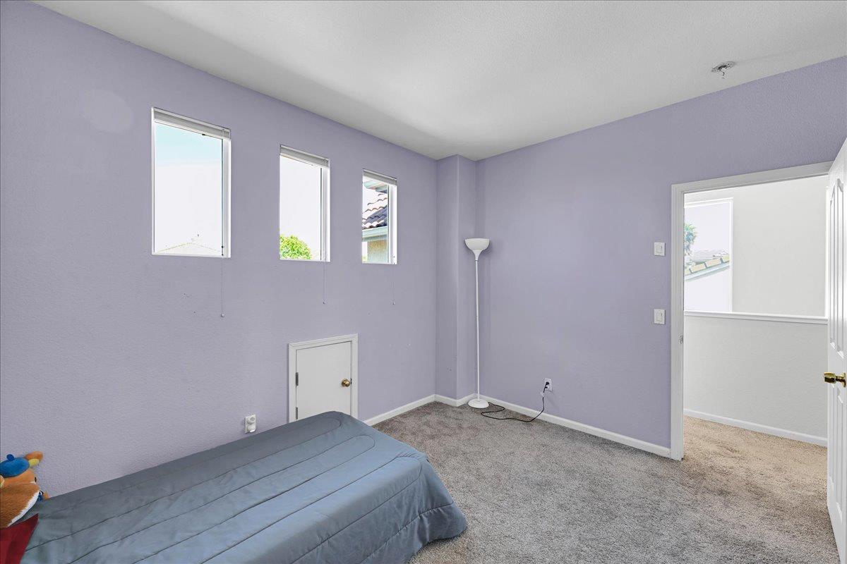 341 Barnhart Circle Sacramento, CA 95835 - Photo 24 of 55 a bedroom with a bed and a window