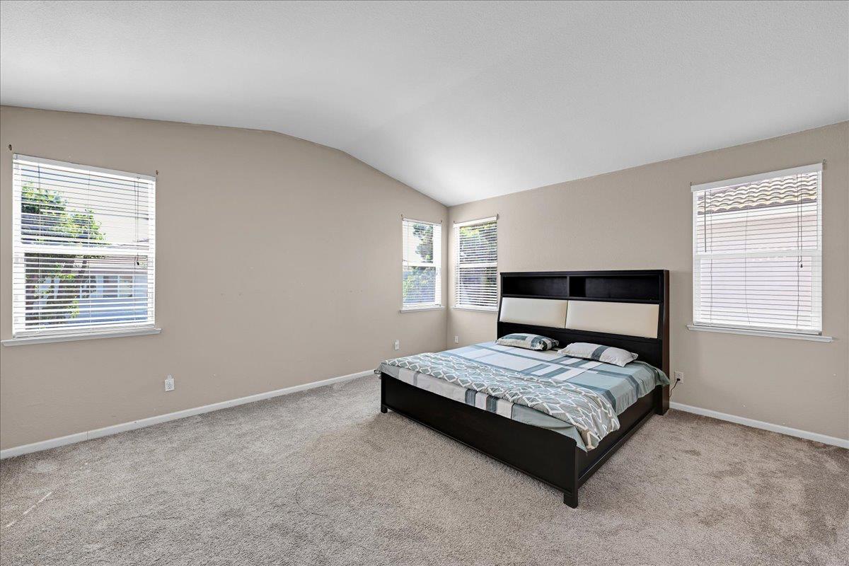 341 Barnhart Circle Sacramento, CA 95835 - Photo 30 of 55 a bedroom with a bed and window