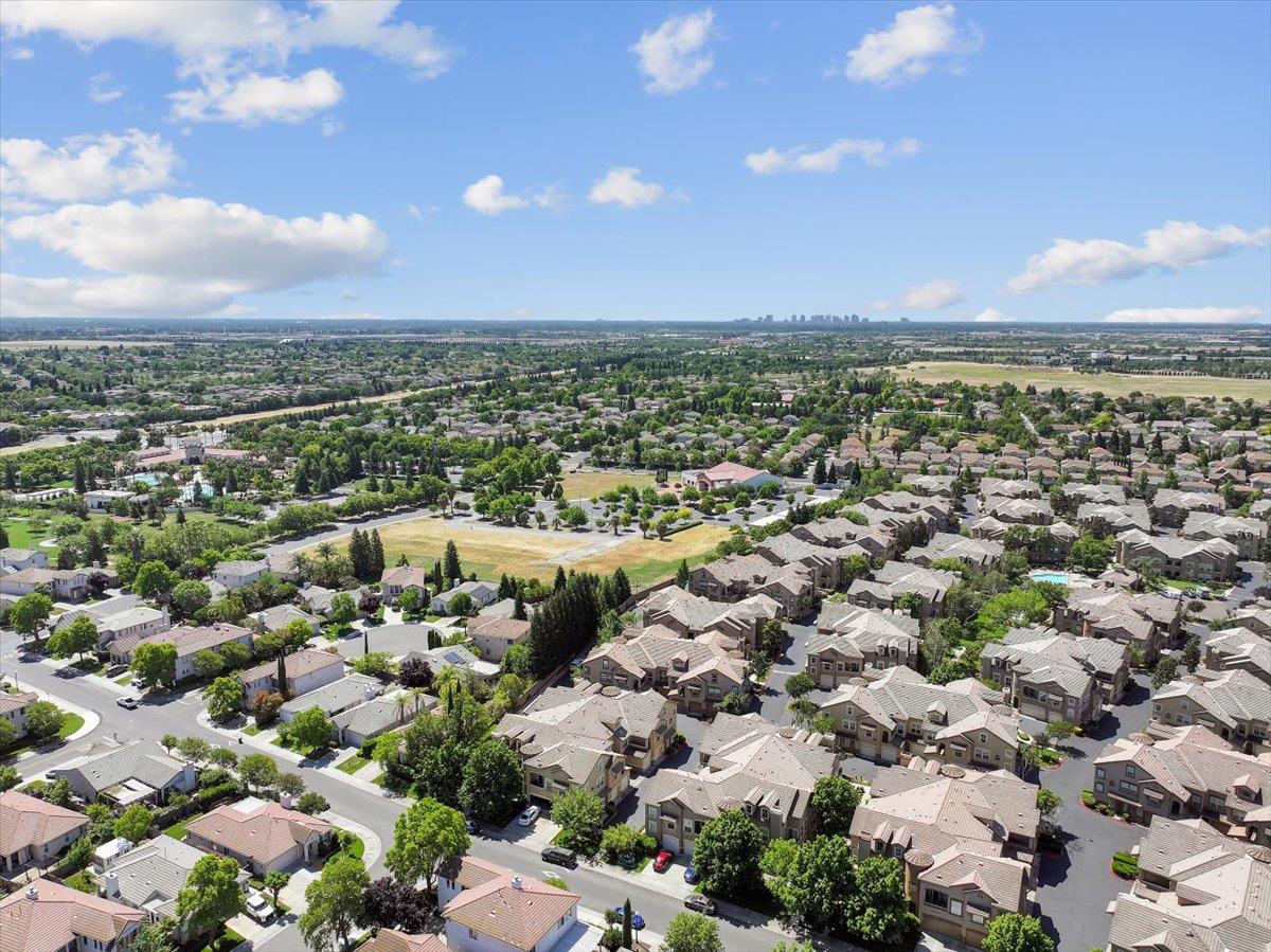 341 Barnhart Circle Sacramento, CA 95835 - Photo 50 of 55 an aerial view of a city with lots of residential buildings and mountain view in back