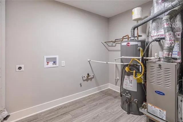 a view of storage and utility room with racks on the wall