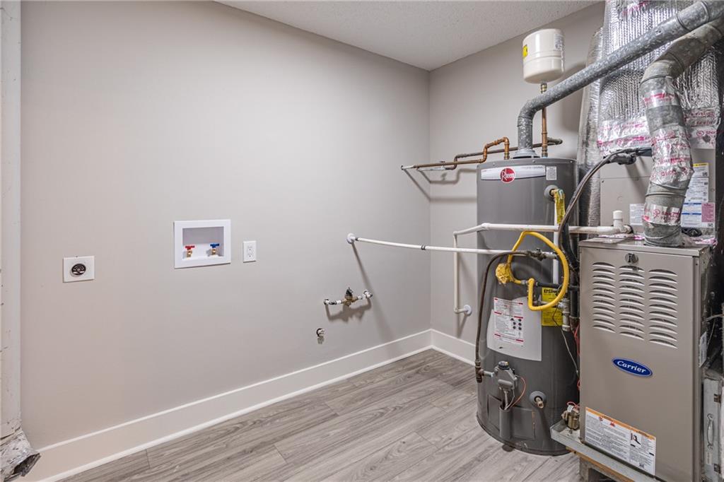 5367 Rails Way Norcross, GA 30071 - Photo 20 of 35 a view of storage and utility room with racks on the wall
