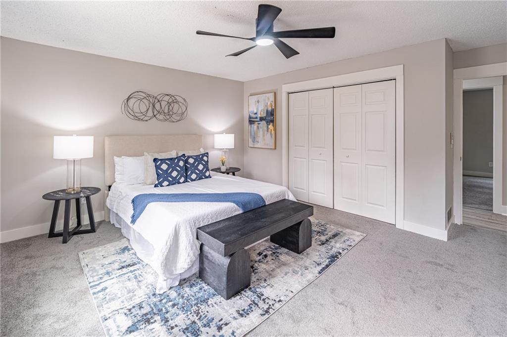 5367 Rails Way Norcross, GA 30071 - Photo 24 of 35 a bedroom with a bed and a table