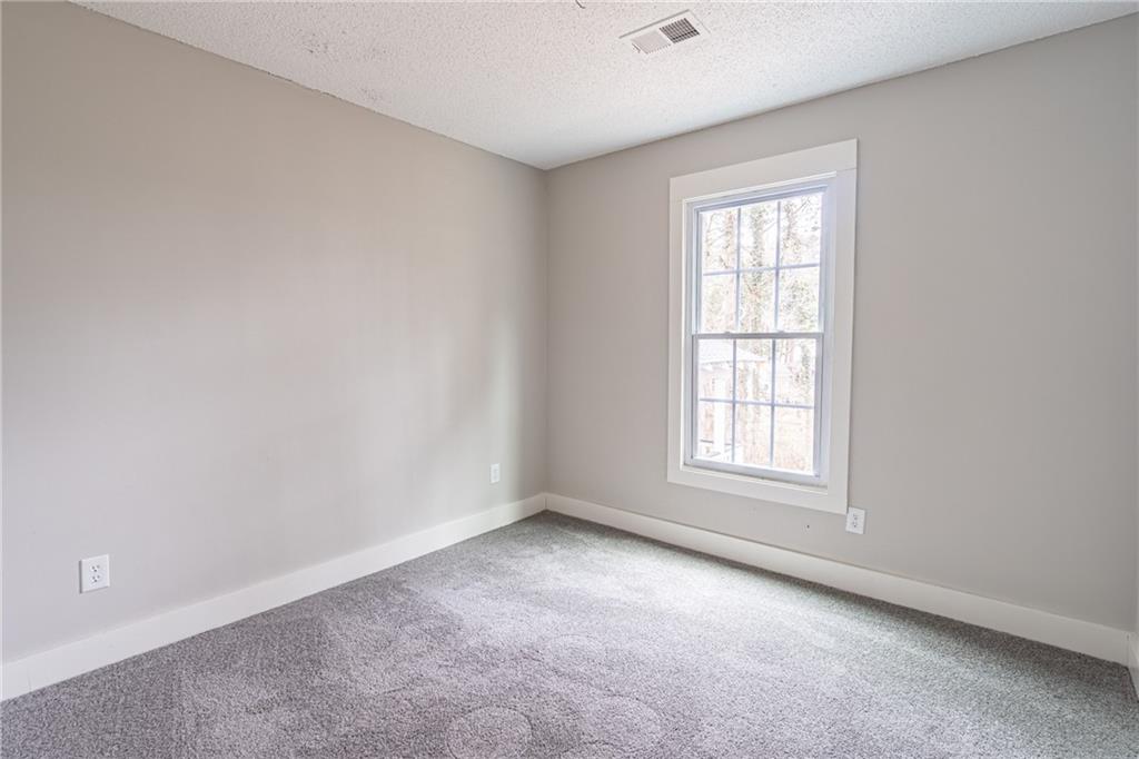 5367 Rails Way Norcross, GA 30071 - Photo 28 of 35 an empty room with a window