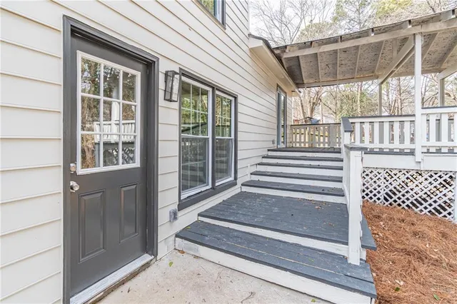 a view of a house with a large window