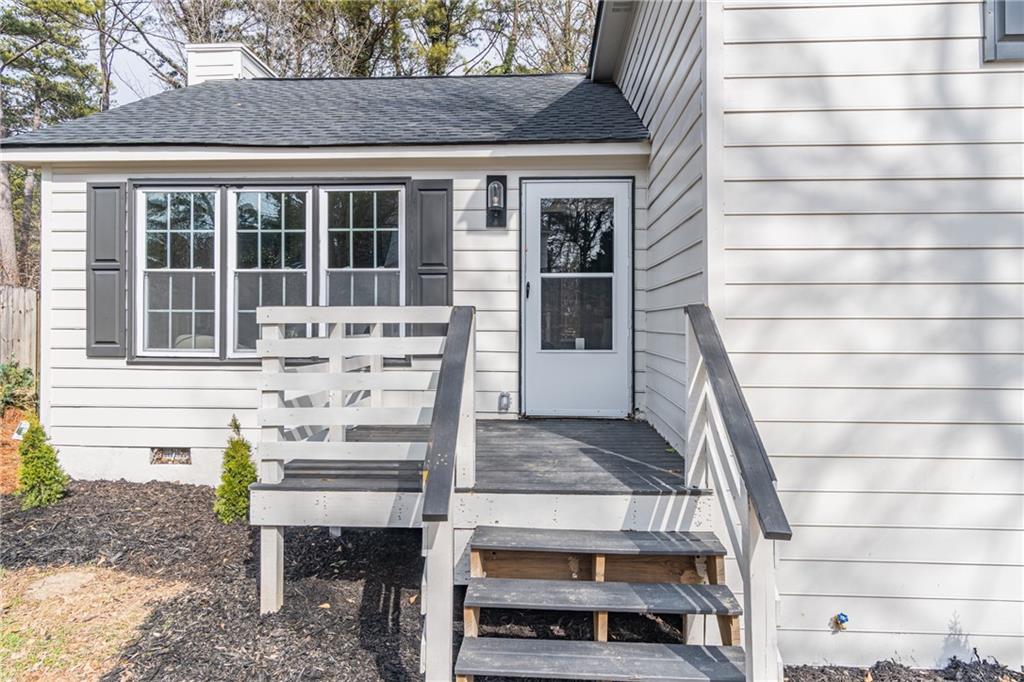 5367 Rails Way Norcross, GA 30071 - Photo 4 of 35 a front view of a house with a porch