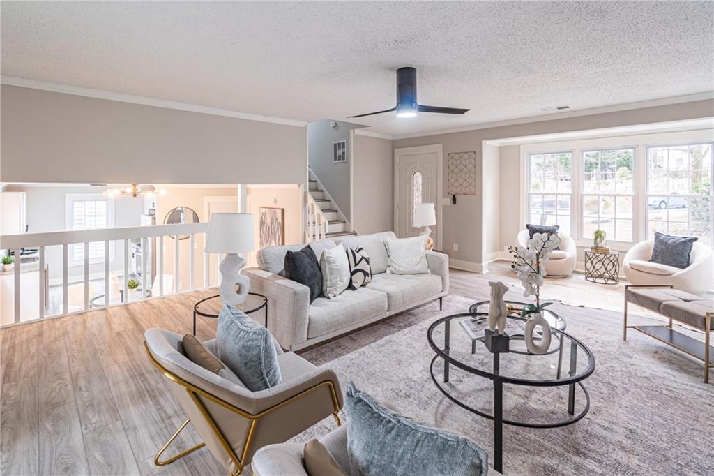 5367 Rails Way Norcross, GA 30071 - Photo 10 of 35 a living room with furniture and a large window