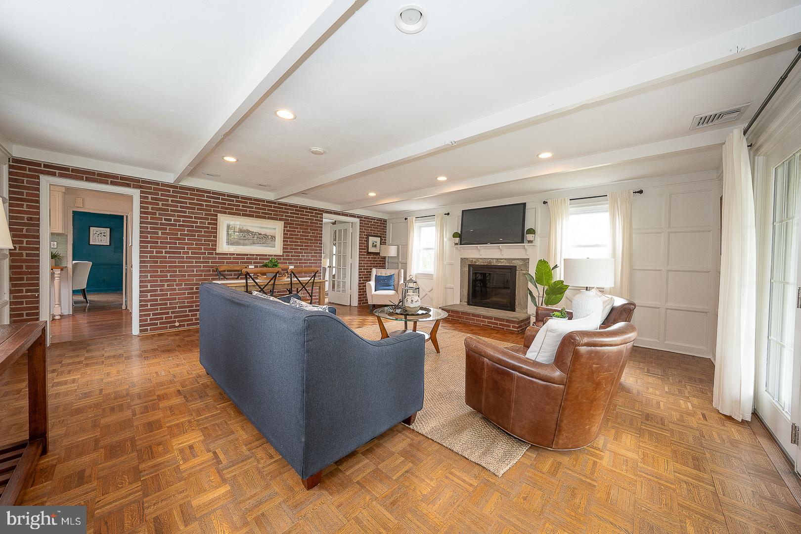 298 Strafford Avenue Wayne, PA 19087 - Photo 18 of 41 a living room with furniture and a fireplace