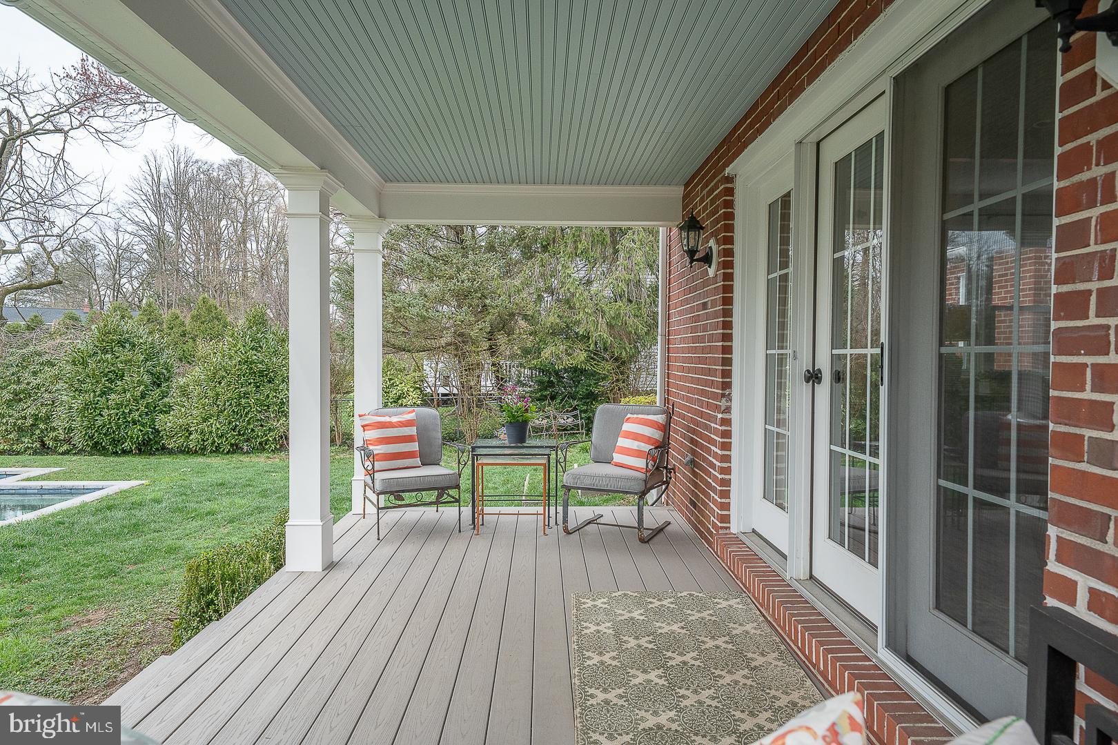 298 Strafford Avenue Wayne, PA 19087 - Photo 20 of 41 a house view with a seating space and garden view