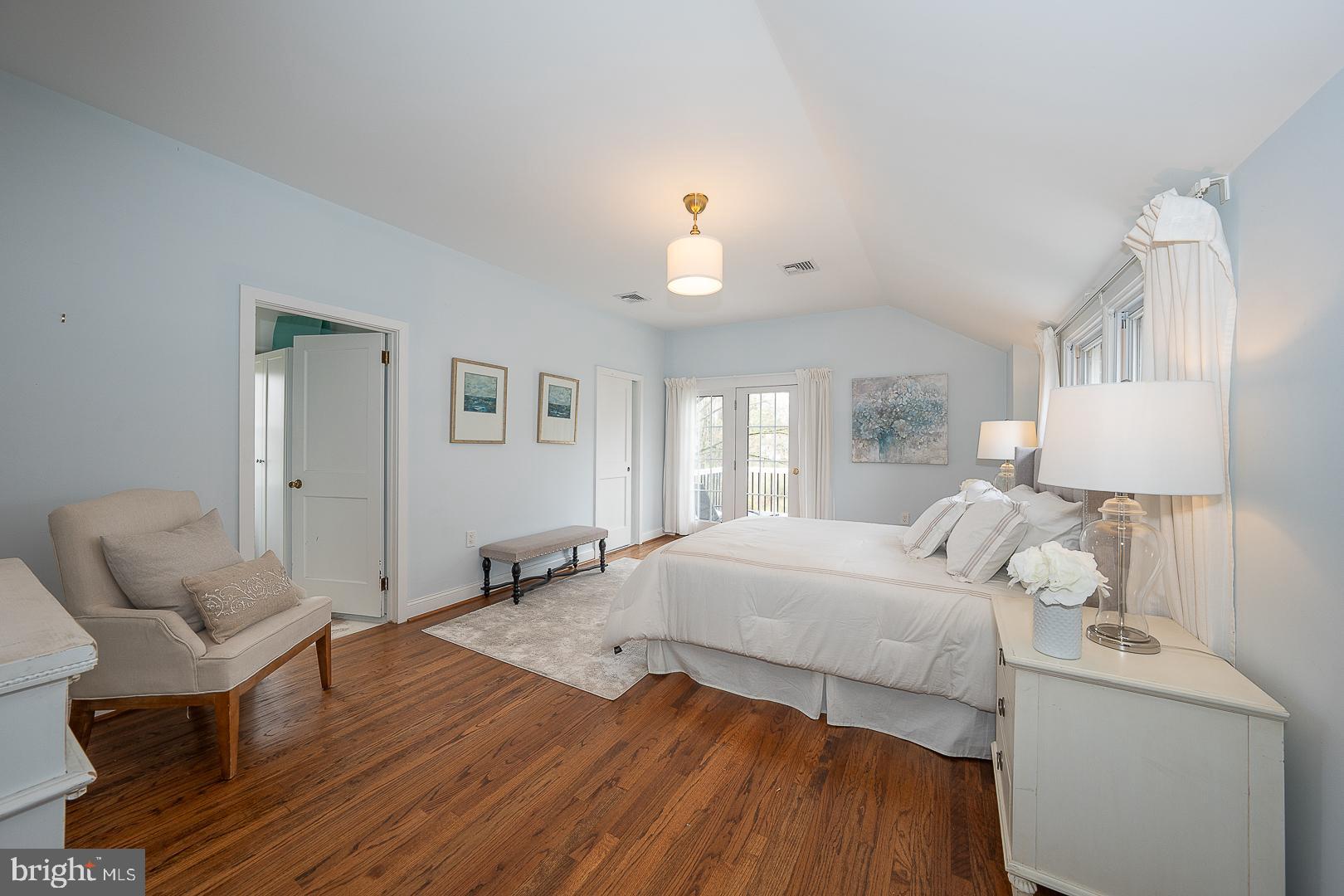298 Strafford Avenue Wayne, PA 19087 - Photo 23 of 41 a bedroom with a bed and wooden floor