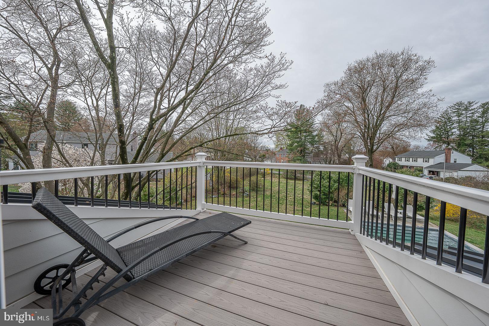298 Strafford Avenue Wayne, PA 19087 - Photo 26 of 41 a view of a wooden deck with a bench