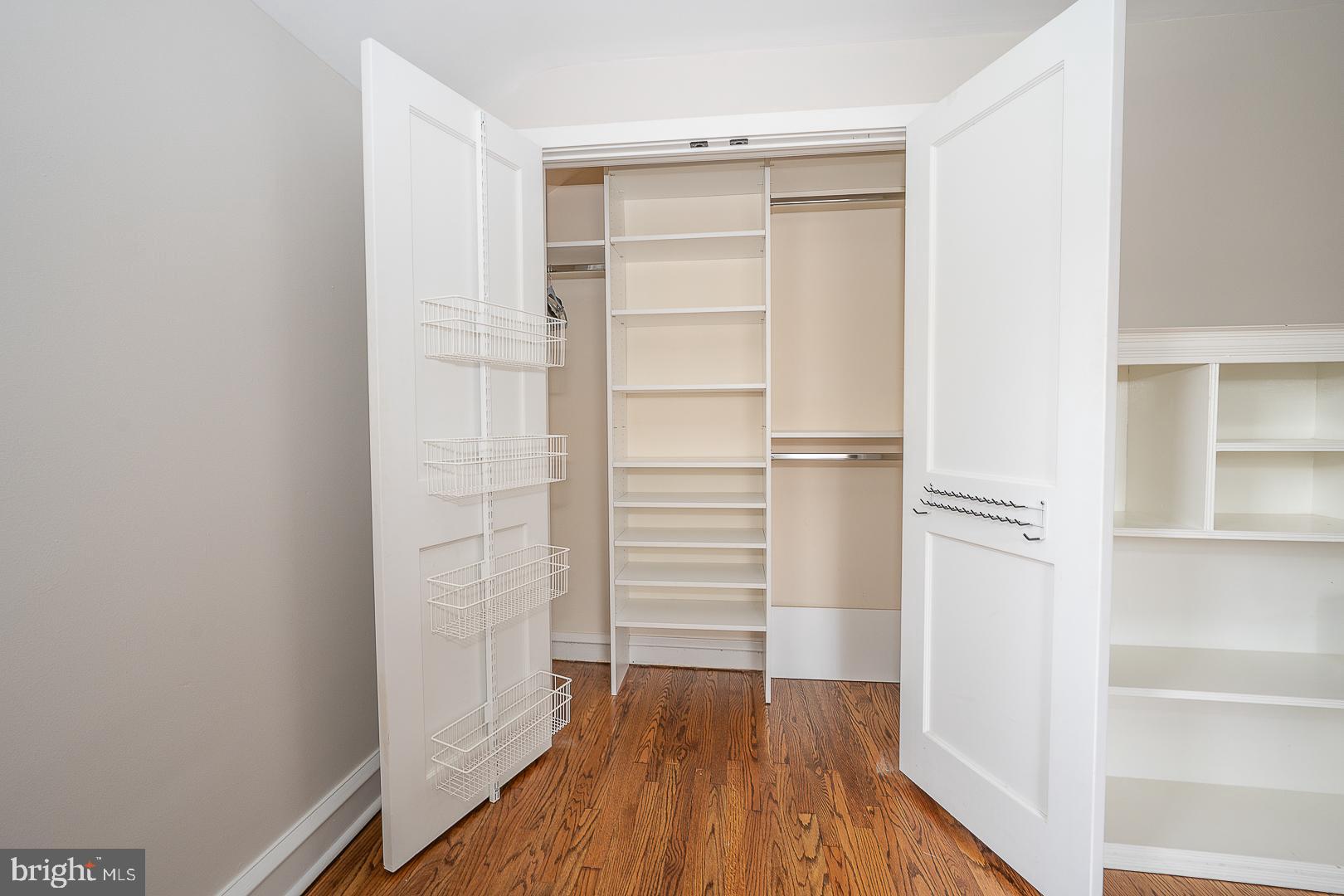 298 Strafford Avenue Wayne, PA 19087 - Photo 32 of 41 a view of walk in closet with wooden floor