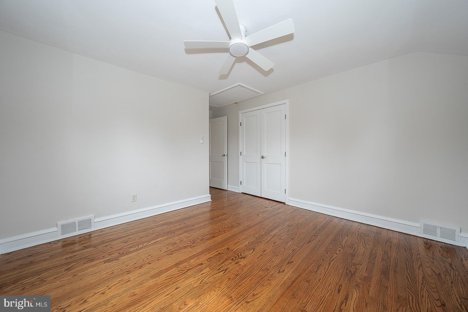 298 Strafford Avenue Wayne, PA 19087 - Photo 34 of 41 a view of an empty room with wooden floor