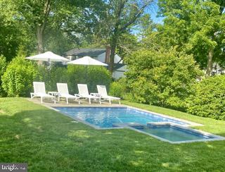 298 Strafford Avenue Wayne, PA 19087 - Photo 41 of 41 a view of a garden with a bench