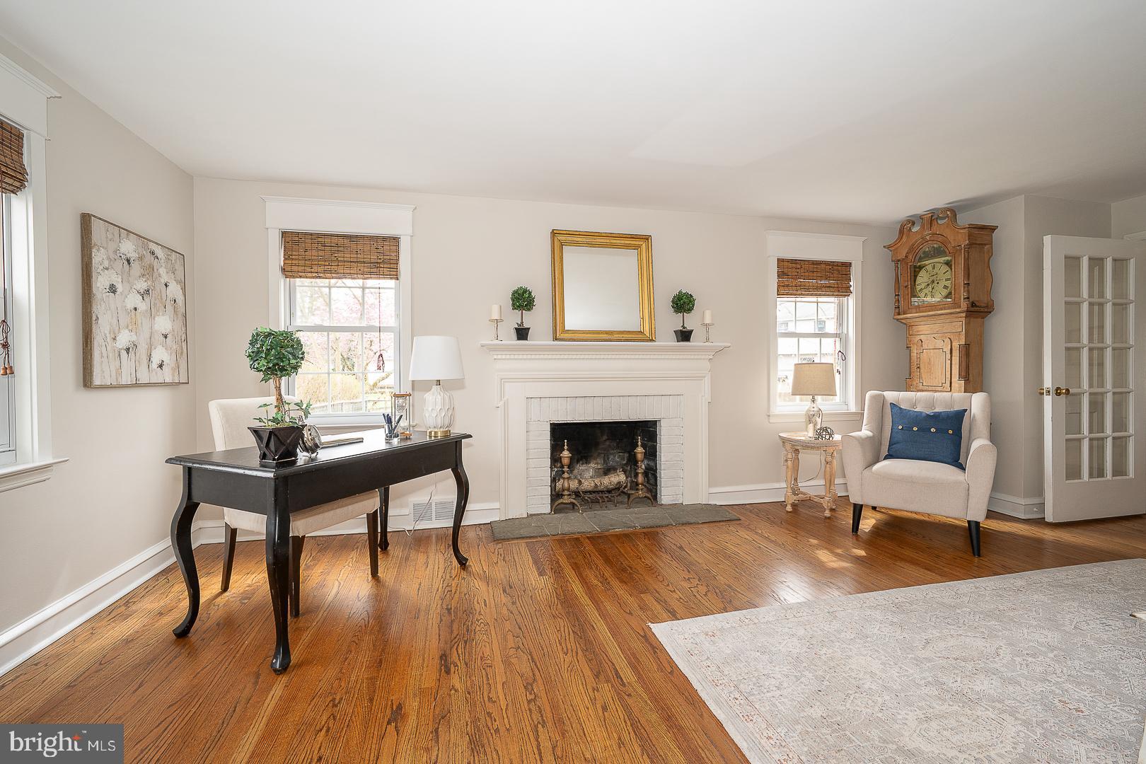298 Strafford Avenue Wayne, PA 19087 - Photo 6 of 41 a living room with furniture and a fireplace