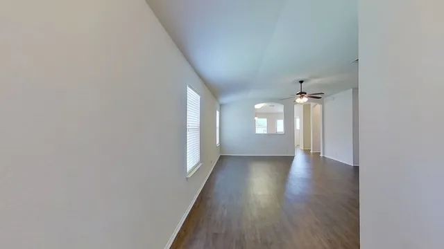 a view of an empty room and window