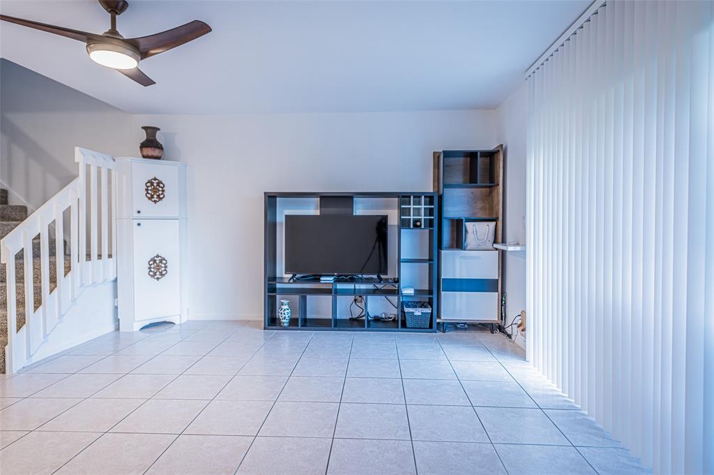6273 Walk Circle Boca Raton, FL 33433 - Photo 11 of 25 a view of a livingroom with furniture and a flat screen tv