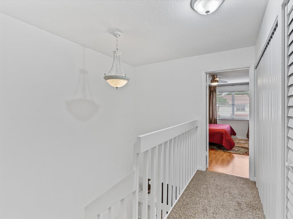 6273 Walk Circle Boca Raton, FL 33433 - Photo 12 of 25 a view of a hallway view with staircase