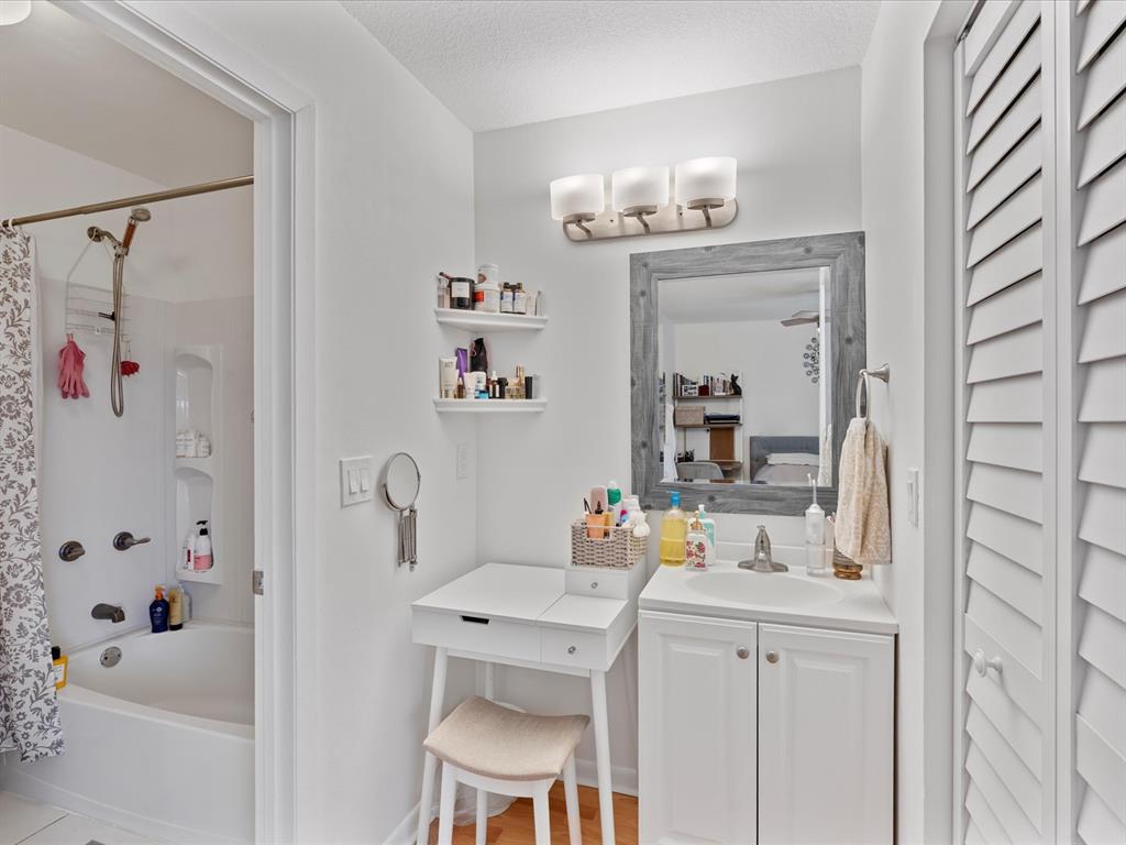 6273 Walk Circle Boca Raton, FL 33433 - Photo 16 of 25 a bathroom with a sink a vanity and a mirror