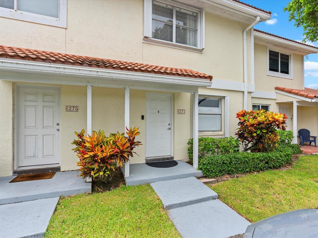 6273 Walk Circle Boca Raton, FL 33433 - Photo 2 of 25 a view of a house with outdoor seating area