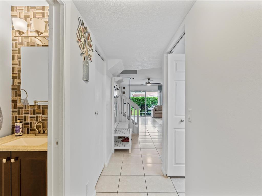 6273 Walk Circle Boca Raton, FL 33433 - Photo 6 of 25 a view of entryway with bathroom and shower