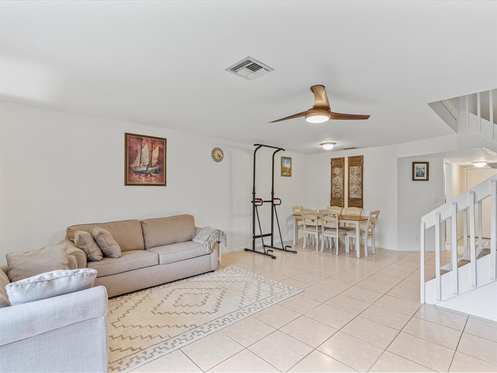 6273 Walk Circle Boca Raton, FL 33433 - Photo 7 of 25 a living room with furniture and a dining table with wooden floor