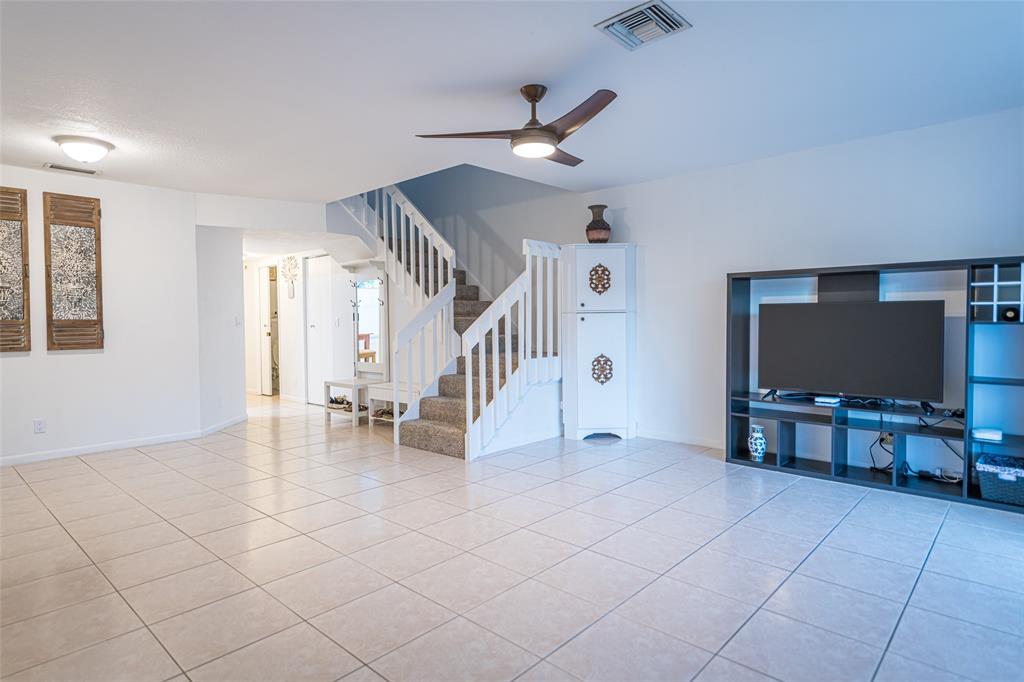 6273 Walk Circle Boca Raton, FL 33433 - Photo 9 of 25 a view of livingroom with furniture and flat screen tv