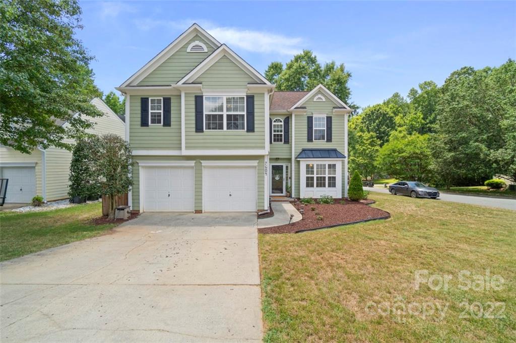 7604 Henderson Park Road Huntersville, NC 28078 - Photo 1 of 1 a front view of a house with yard and green space