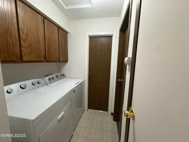 a view of utility room with washer and dryer