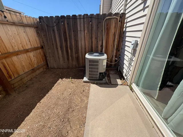 a bedroom with a bed and a mirror